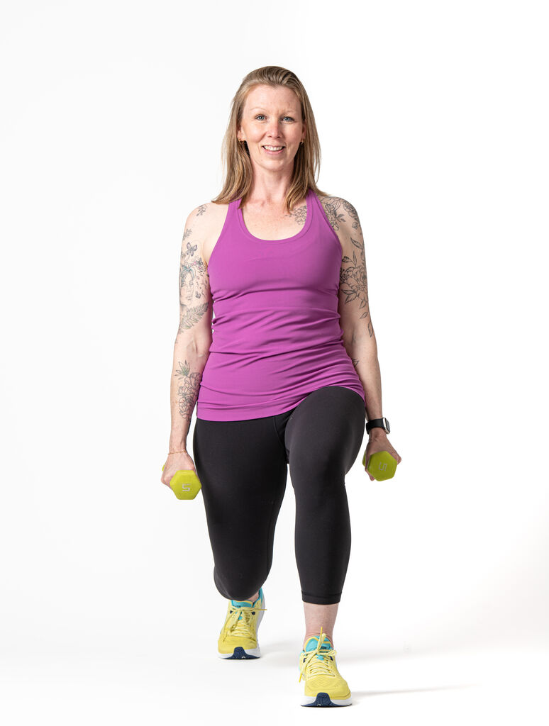 A member training with weights at Studio IPF